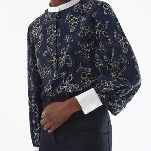 Judith & Charles Alba blouse is a floral printed silk long-sleeve button-up top